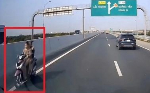 X&aacute;c định danh t&iacute;nh c&ocirc; g&aacute;i trẻ điều khiển xe m&aacute;y đi ngược chiều tr&ecirc;n cao tốc